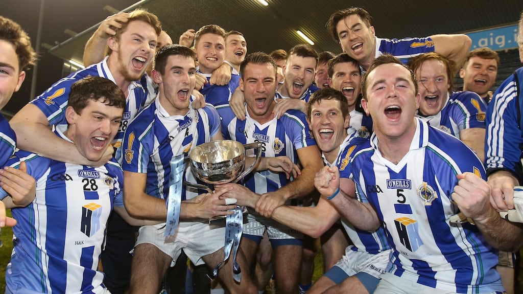 Ballyboden St Enda’s players celebrate with the cup after beating St Vincent’s to win the 2015 Dublin senior football championship. Photo: Cathal Noonan/Inpho