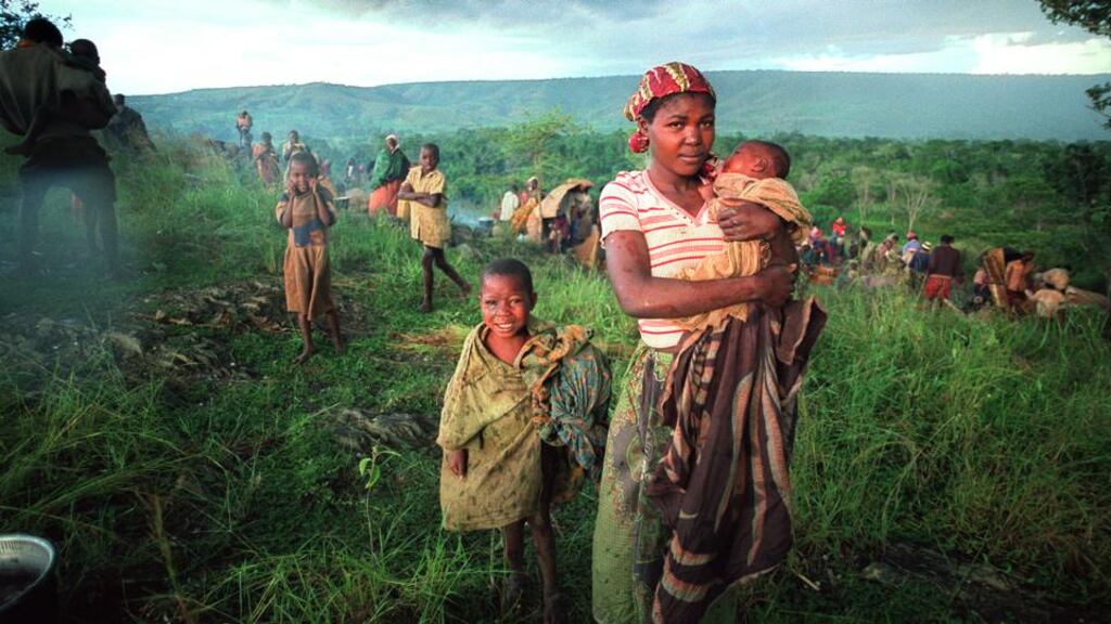 Refugees on a hillside just inside Tanzania having crossed the Kagera River dividing Rwanda and Tanzania in May 1994. Photograph: Frank Miller