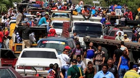 Thousands flee Venezuela daily as humanitarian crisis intensifies