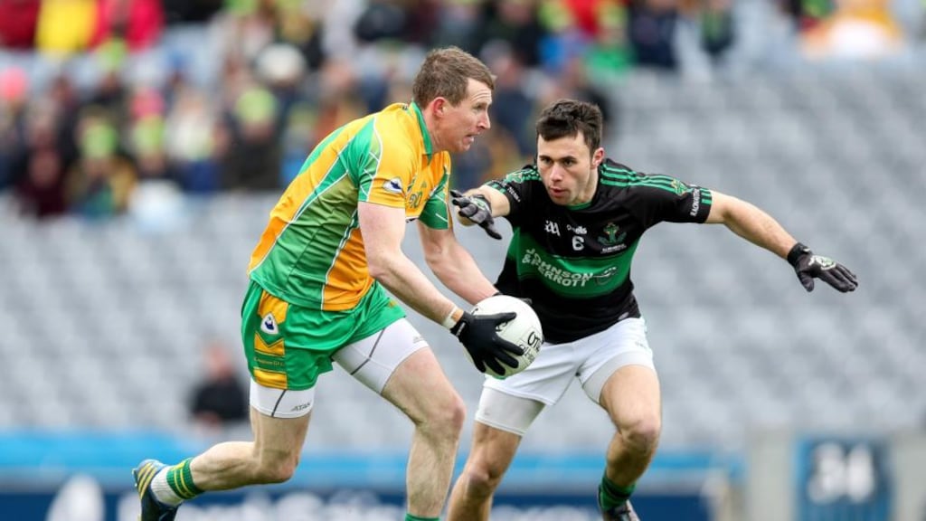 Corofin’s Gary Sice with Stephen Cronin of Nemo Rangers in the All-Ireland Senior Football Club Championship final at Croke Park. Photograph: Gary Carr/Inpho