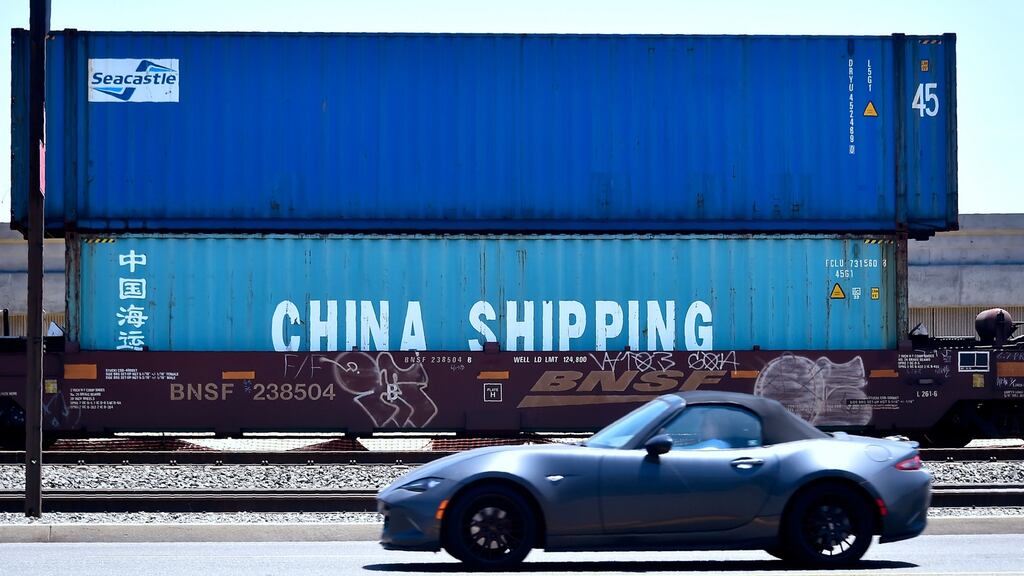 Shipping containers awaiting transportation on a railway line in Long Beach, California. Photograph: Frederic J Brown/AFP/Getty Images