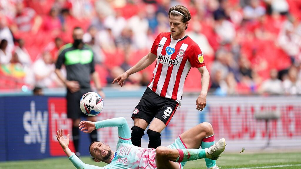 Swansea City’s Conor Hourihane and Brentford’s Mathias Jensen battle for the ball during the Championship playoff final at Wembley Stadium, London on Saturday. Photograph: Mike Egerton/PA Wire