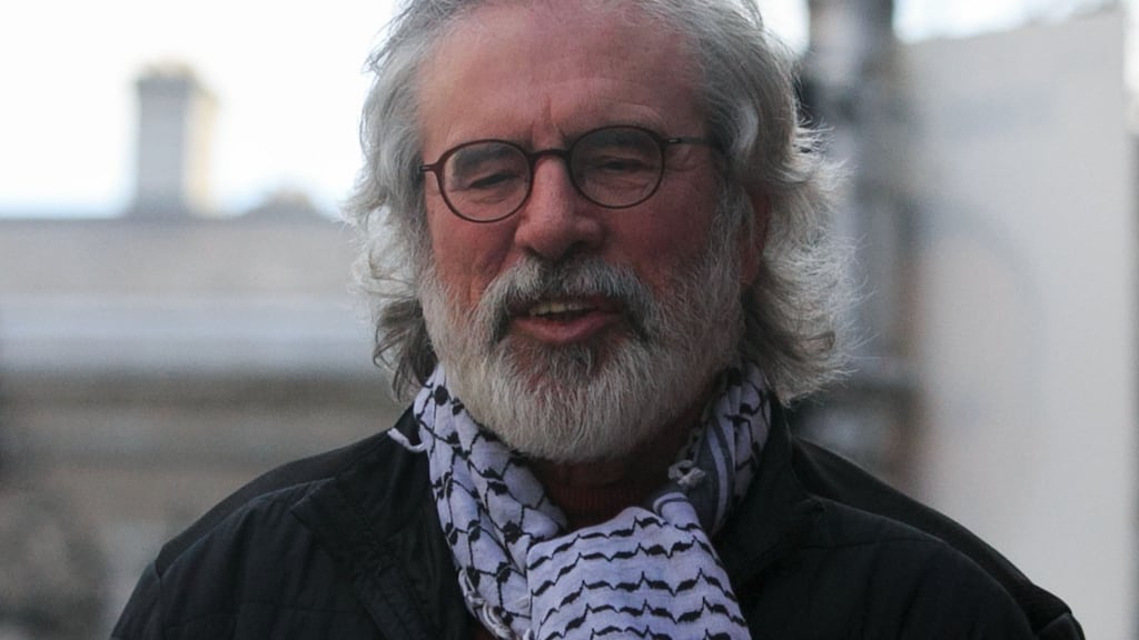 With his PLO scarf, hopalong foot, Bee-Gees hair and sweat shirt emblazoned with the image of Mexican revolutionary Emialiano Zapata, Gerry Adams somehow managed to be the centre of attention. Photograph: Gareth Chaney /Collins