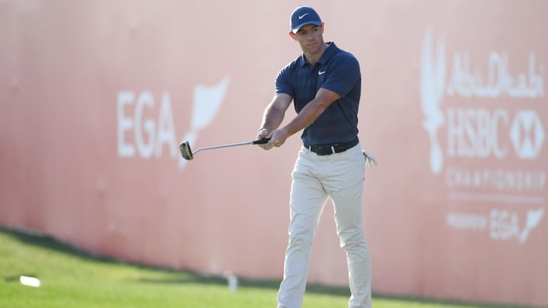 Rory McIlroy reacts to his eagle on the 18th green during round two of the Abu Dhabi HSBC Golf Championship. Photograph: Ross Kinnaird/Getty Images