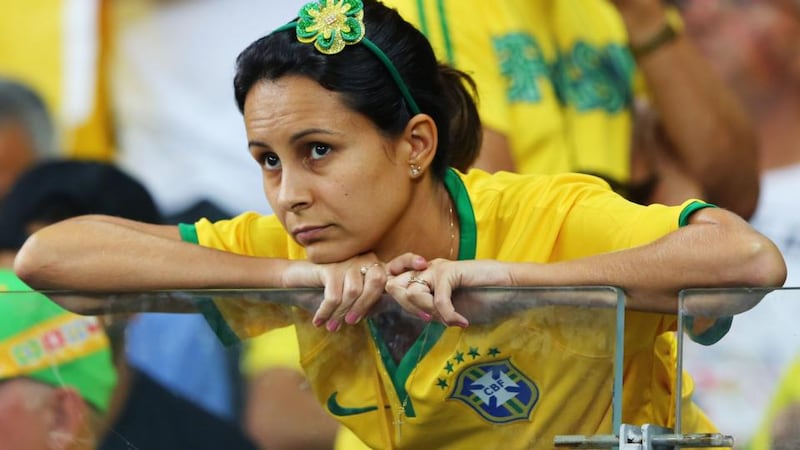 A Brazil fan looks on in Belo Horizonte. Photograph: Martin Rose/Getty Images
