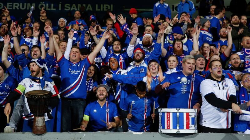 Iceland’s fans celebrate their team’s victory over Kosovo in Reykjavik which sealed their place in the World Cup as Group 1 winners. Photograph: Brynjar Gunnarsson/AP Photo