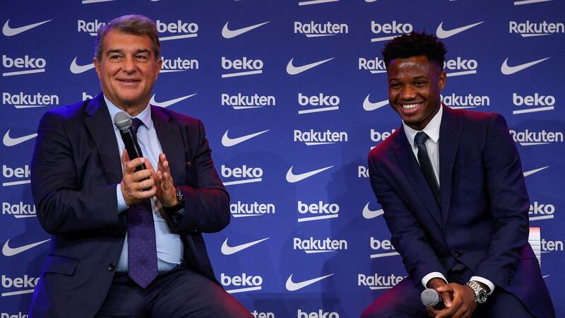 Barcelona president Joan Laporta addresses a press conference during Ansu Fati’s contract renewal signing ceremony on Thursday. Photograph: Josep Lago/AFP via Getty Images