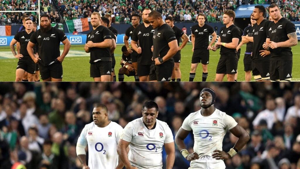 New Zealand and England players after losing their winning records to Ireland. Photographs: Inpho