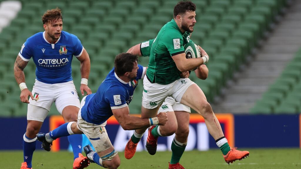 Robbie Henshaw carries the ball during Ireland’s win over Italy. Photograph: Billy Stickland/Inpho