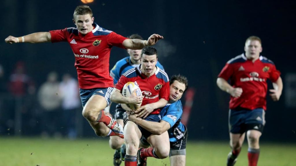 Munster’s Gerry Hurley tackled by Sean Romans of Nottingham during last night’s British & Irish Cup at St Mary’s RFC, Limerick. Photograph: Dan Sheridan/Inpho