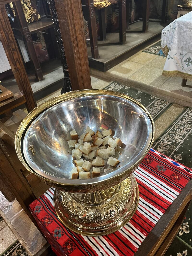 The congregation themselves collected communion – actual pieces of white bread, torn from a loaf – out of a large chalice