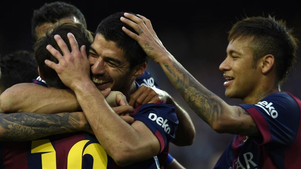 Lionel Messi, Luis Suarez and Neymar celebrate a goal during the 6-0 Primera Division clash against Getafe at the Nou Camp. Photo: Lluis Gene/AFP/Getty Images