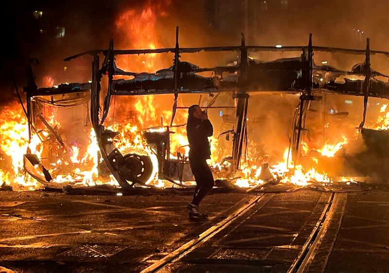 A burning bus during the peak of the Dublin riots. Photograph: Alan Betson