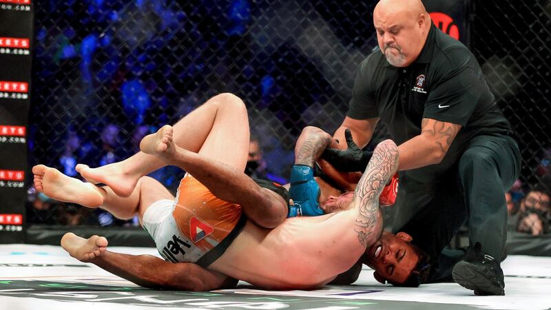 James Gallagher (red) in action against Patchy Mix (blue). Photo: Bryan Keane/Inpho