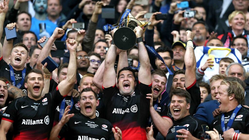 Saracens’ Brad Barritt lifts the European Champions Cup trophy after victory over Racing 92. “I have a soft spot for Saracens ever since I spent a day at the club last year.” Photograph: Adam Davy/PA
