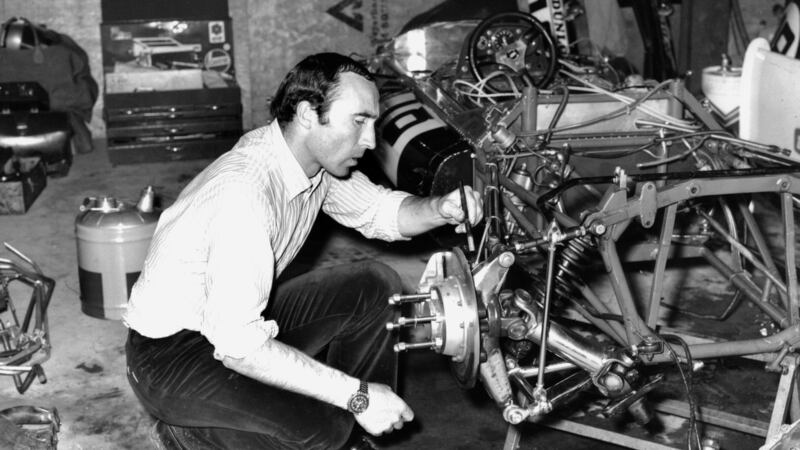 Frank Williams works on an F1 car in his team garage in 1969. Photograph: Curzon Artificial eye