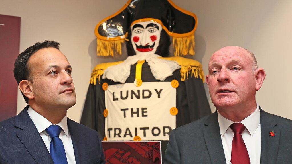 Taoiseach Leo Varadkar (left) with General Secretary of the Apprentice Boys of Derry William Moore during a visit to the association’s Memorial Hall in Londonderry. In between them is an effigy of “Lundy”, regarded as a traitor by loyalists during the Siege of Derry in 1689. Photograph: Brian Lawless/PA Wire
