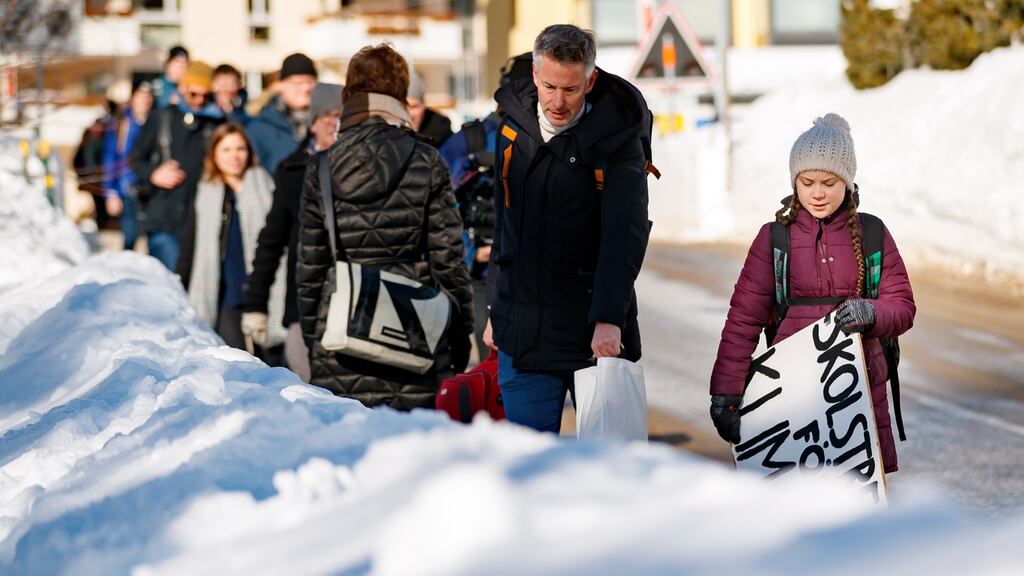 Climate Change protestors in Davos. Photograph: Valentin Flauraud/EPA