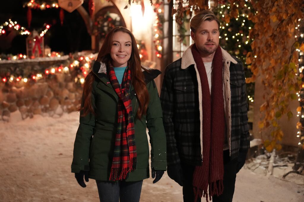 Lindsay Lohan as Sierra and Chord Overstreet as Jake in Falling for Christmas. Photograph: Netflix