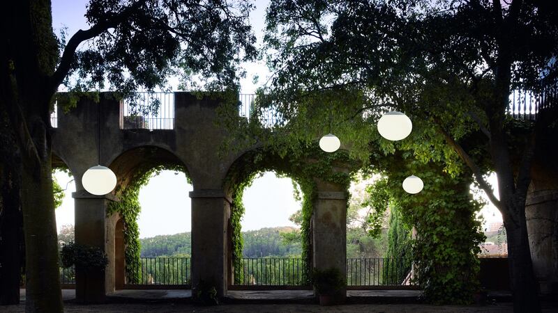 The polyethylene sphere ceiling pendant, which has brass, iron and aluminum detailing, has been designed by Alex Fernandez Camps and Gonzalo Mila and offers a soft glow