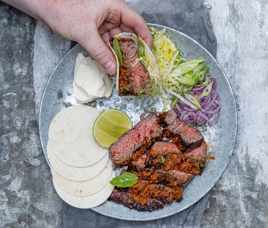 Barbecue bavette with salsa roja and corn tacos. Photograph: Harry Weir
