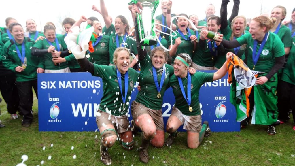 Ireland's women, led by Joy Neville, Fiona Coghlan and Lynne Cantwell, celebrate their Six Nations Grand Slam after the win over Italy. Photograph: Dan Sheridan/Inpho