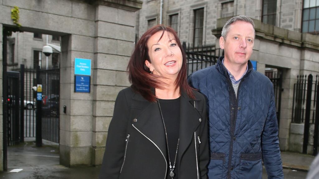 Catherine and Colm Sheehan of Mallow, Co Cork  leaving the Four Courts  after they were awarded damages following a High Court action on behalf of their daughter, Isabelle. Photograph: Courts Collins