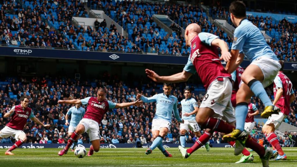 Sergio Aguero scores Manchester City’s opening goal against West Ham during their Premier League match at The Etihad Stadium. Photograph: Darren Staples/Reuters