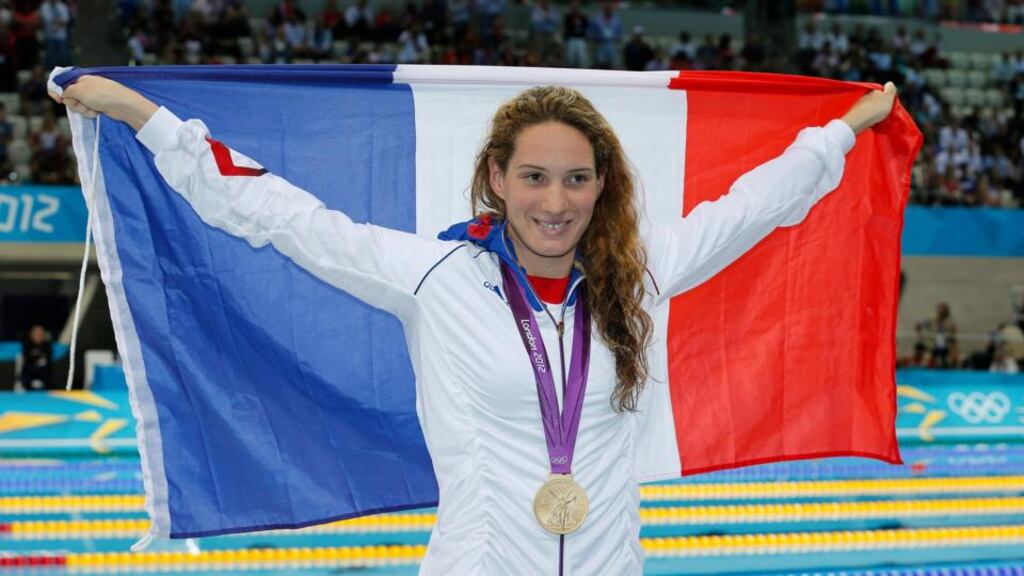 Camille Muffat of France celebrates winning the gold medal in the women’s 400m freestyle final at the London 2012 Olympic Games. Ten people, including Muffat, former boxer Alexis Vastine and yachtswoman Florence Arthaud, were killed on Monday when two helicopters collided in northern Argentina, news reports said. Photograph: Patrick B Kraemer/EPA