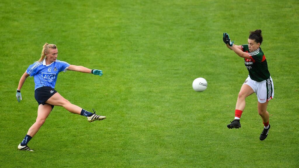 Carla Rowe of Dublin in action against Kathryn Sullivan of Mayo. Photograph: Sportsfile