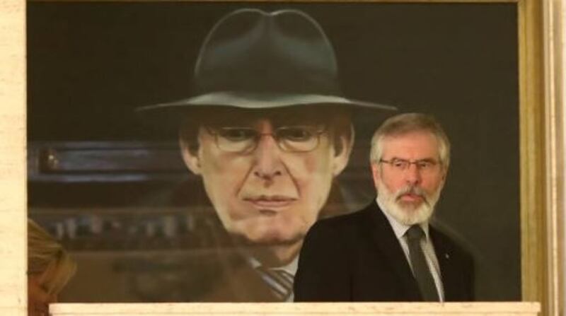 Sinn Féin president Gerry Adams in front of a portrait  at Stormont of late DUP leader Rev Ian Paisley: “All of the big-ticket issues from 1998 (legacy, truth, culture, integration, consensus and institutional stability) remain unresolved. Worse, a whole new list of problems has been added to the mix.” File photograph: Getty Images