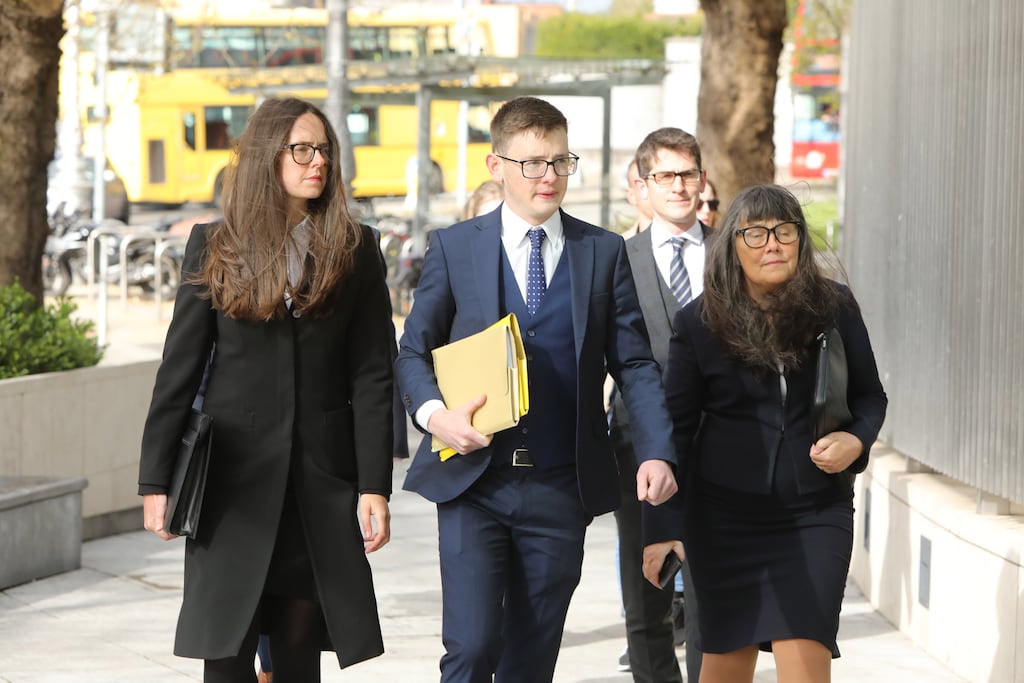Simeon Burke (centre) with his sister Ammi, mother Martina and other family members. Photograph: Collins Courts