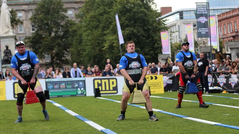 Competitors in the 200kg Duck Walk event during the UK Strongest Man 2016 heats at Belfast City Hall, Belfast. Photograph: Niall Carson/PA Wire