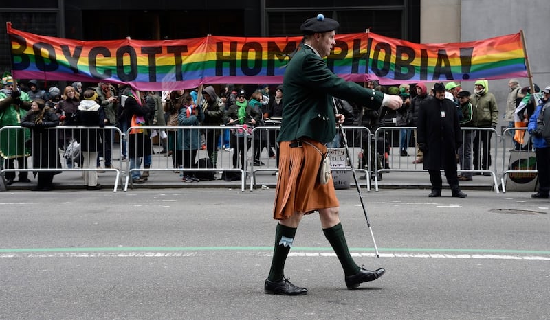 Taoiseach Enda Kenny is interviewed while walking in the annual St Patrick’s Day parade along Fifth Ave in Manhattan in New York City. Photograph: Andrew Burton/Getty Images.
