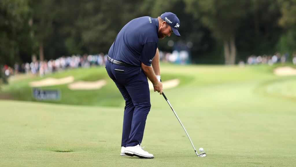 Shane Lowry plays his second shot into the first hole during day three of The BMW PGA Championship at Wentworth Golf Club. Photo: Richard Heathcote/Getty Images
