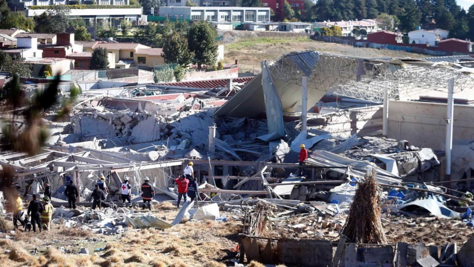 Rescue workers are seen at the site of an explosion at a maternity hospital in Mexico City. Photograph: Reuters