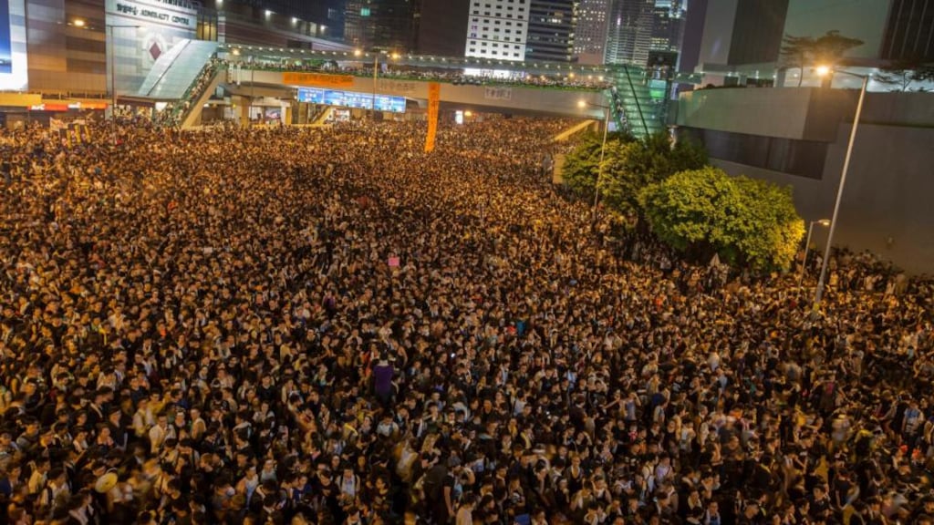 Pro-democracy protesters gather outside the Hong Kong government headquarters. Photograph: Alex Hofford/EPA