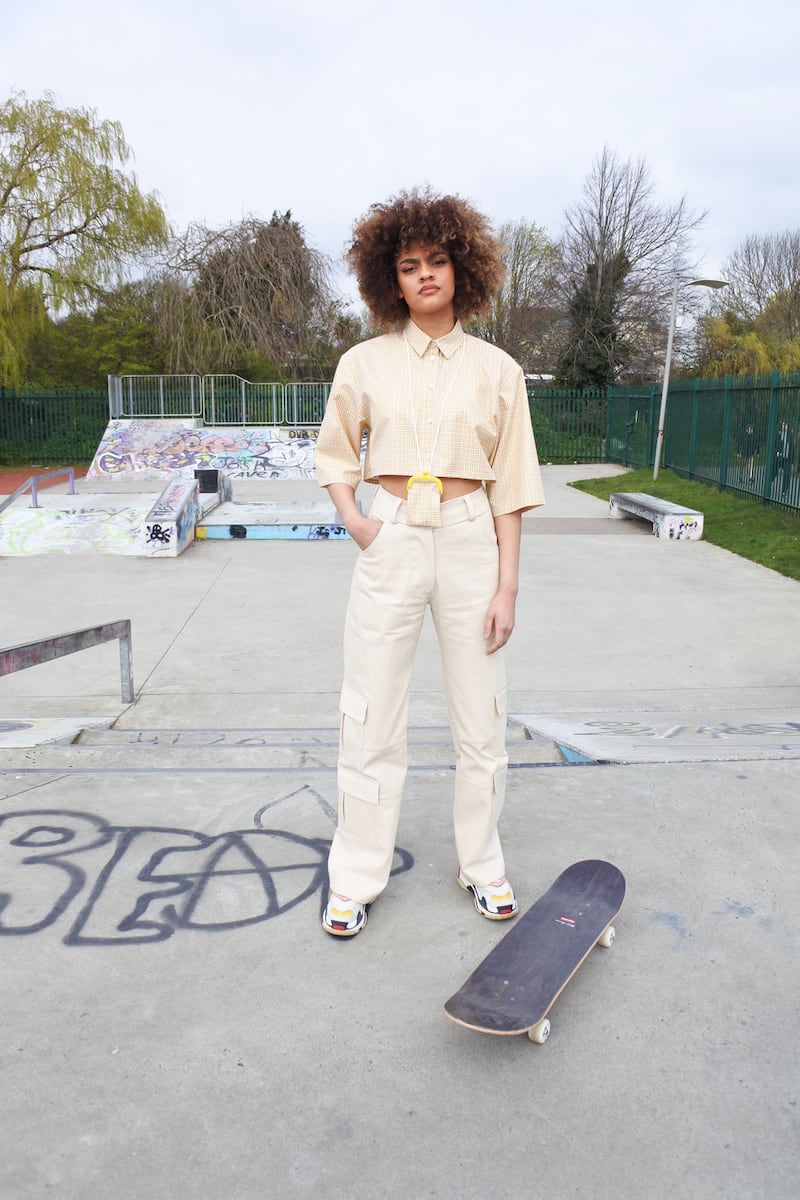 Cream denim jeans €145, yellow check shirt €62, cream denim Velcro vest €94