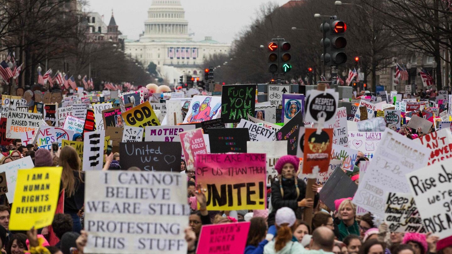 Demonstrators walk down Pennsylvania Avenue during the Women’s March on Washington on Saturday. Photograph: Zach Gibson/AFP/Getty Images