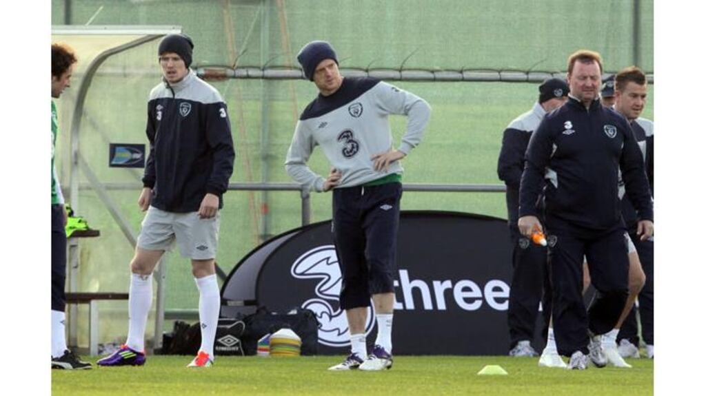 Damien Duff limbers up ahead of Ireland’s training session in Malahide this afternoon. Photograph: Donall Farmer/Inpho