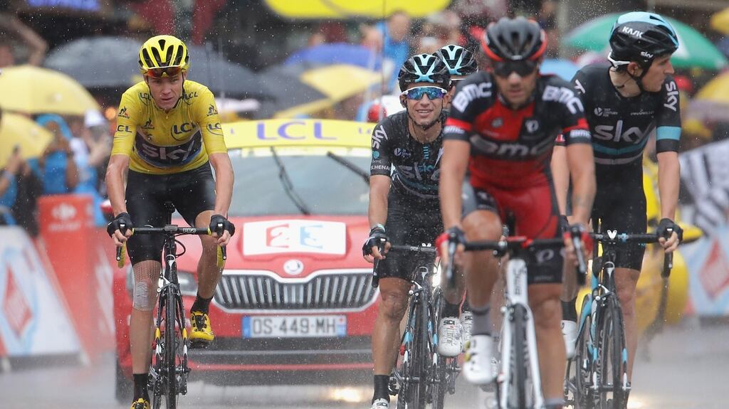 Chris Froome of Team Sky looks on in the rain as he finished stage 20 of the 2016 Le Tour de France, from Megeve to Morzine. Photograph: Chris Graythen/Getty Images