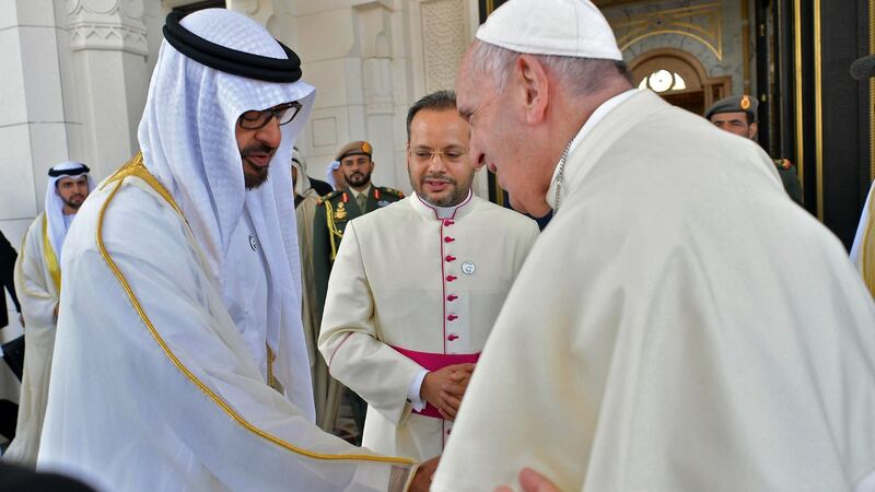 Pope Francis (R) shakes hands with Abu Dhabi’s Crown Prince Mohammed bin Zayed al-Nahyan in the UAE capital. Photograph: Vatican media/AFP/Getty Images
