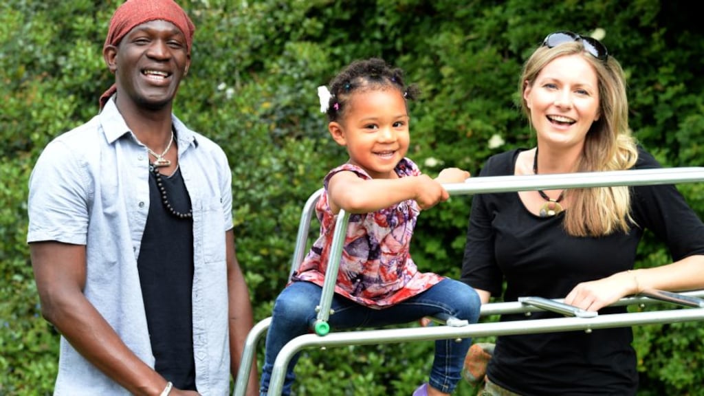 Lefah Ballo with his partner, Caitríona Rodgerson, and their daughter, Nina, in Churchtown, Dublin. The couple met in Africa in 2012. Photograph: Eric Luke