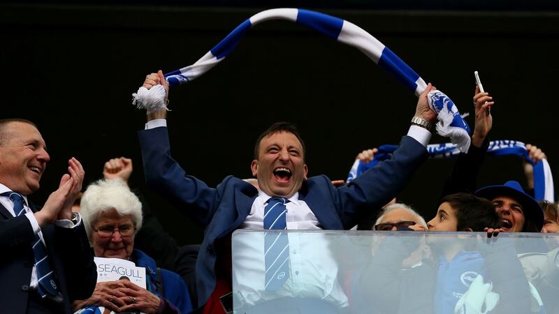 Brighton chairman Tony Bloom celebrates. Photo: Gareth Fuller/PA