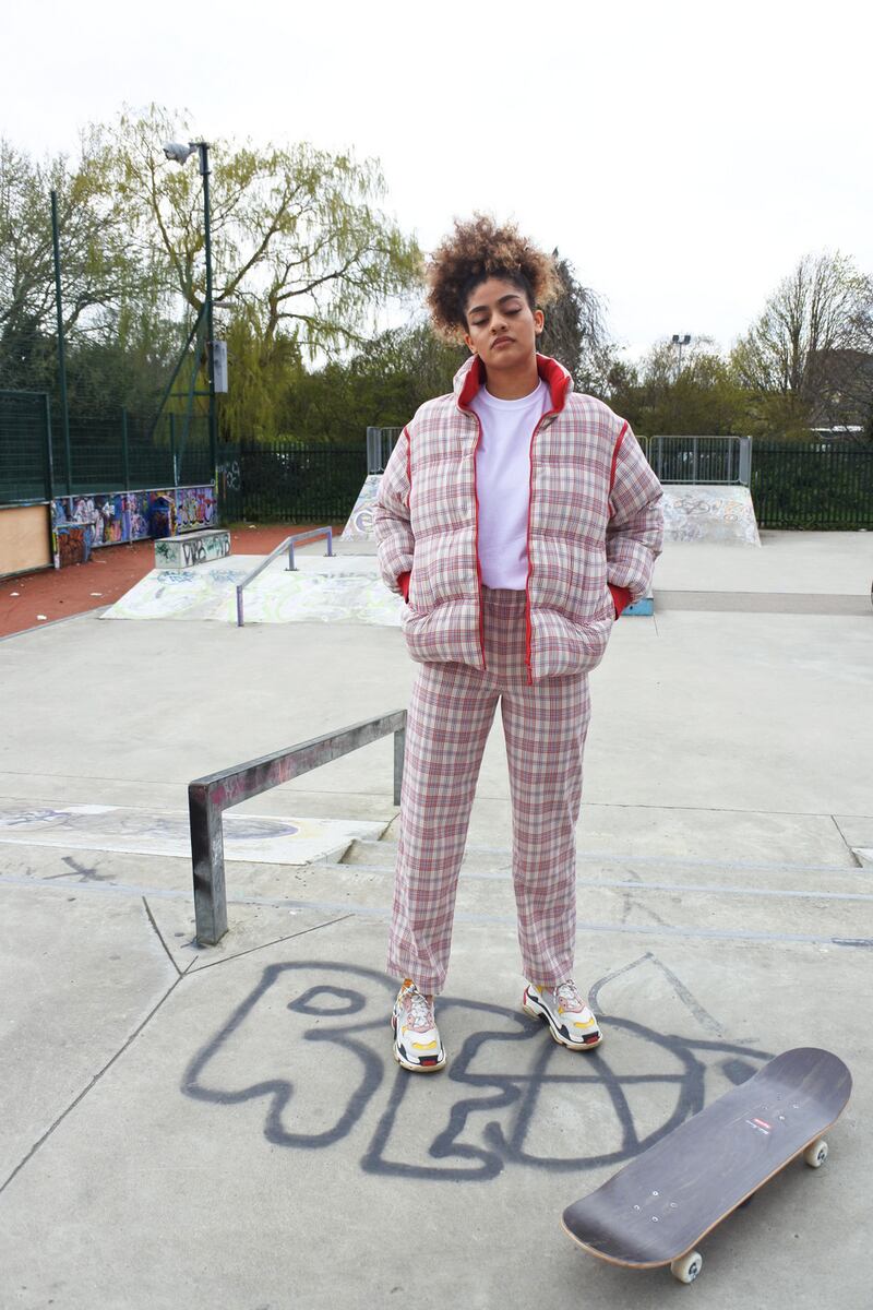 Check puffa with detachable sleeve €270, check trousers €110