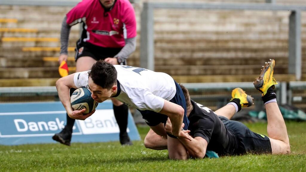 Methodist College’s Chris Bradley is denied a try by Lukas Kenny of Campbell College during the Danske Bank Ulster Schools Senior Cup Final at Kingspan Stadium in Belfast. Photograph: William Cherry/Inpho/Presseye