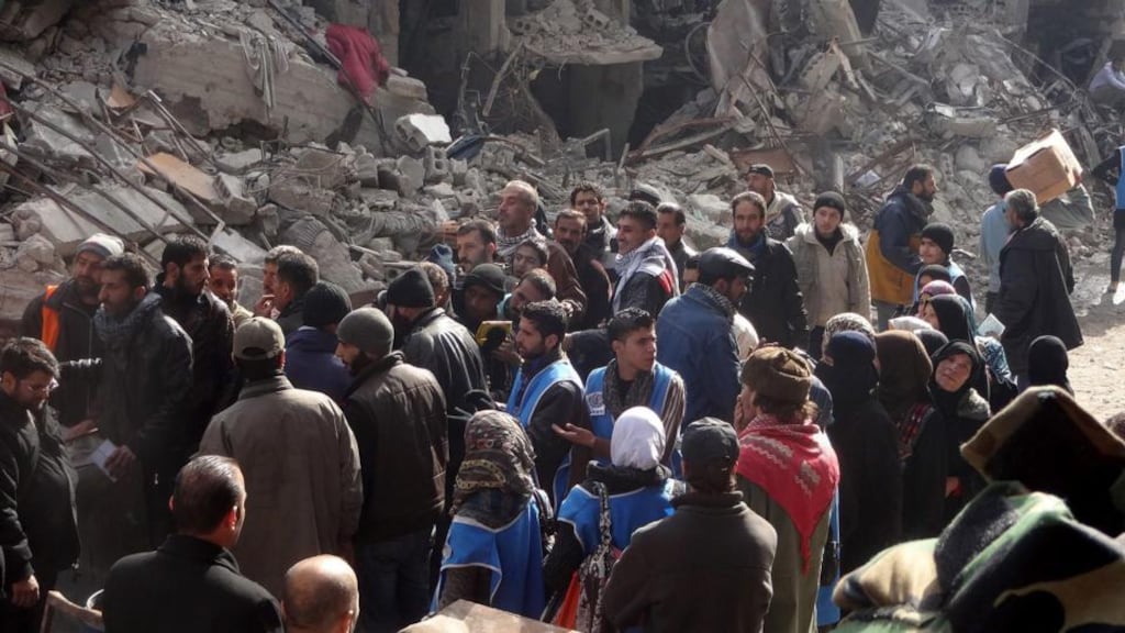 Palestinians wait for food supplies in the Yarmouk refugee camp in Damascus, Syria. Islamic State has taken control of 90 per cent of the camp, according to monitoring groups. File photograph: Sana/EPA.