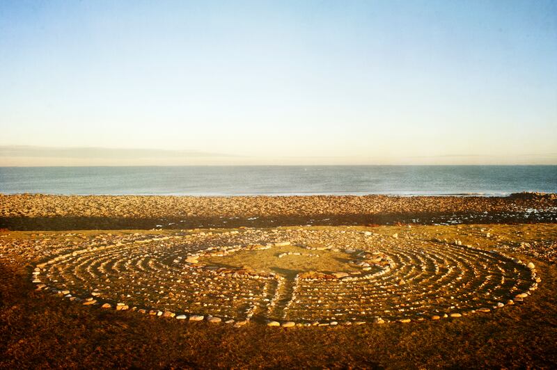 A walking labyrinth on the sea shore at Lindisfarne. Photograph: Getty