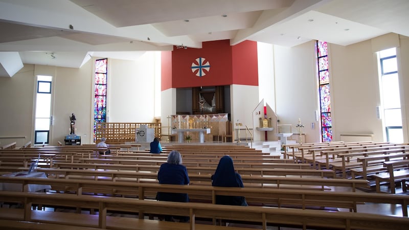 People in St Jude’s church in Templeogue, south Dublin taking part in a vigil for a No vote. Photograph: Tom Honan.