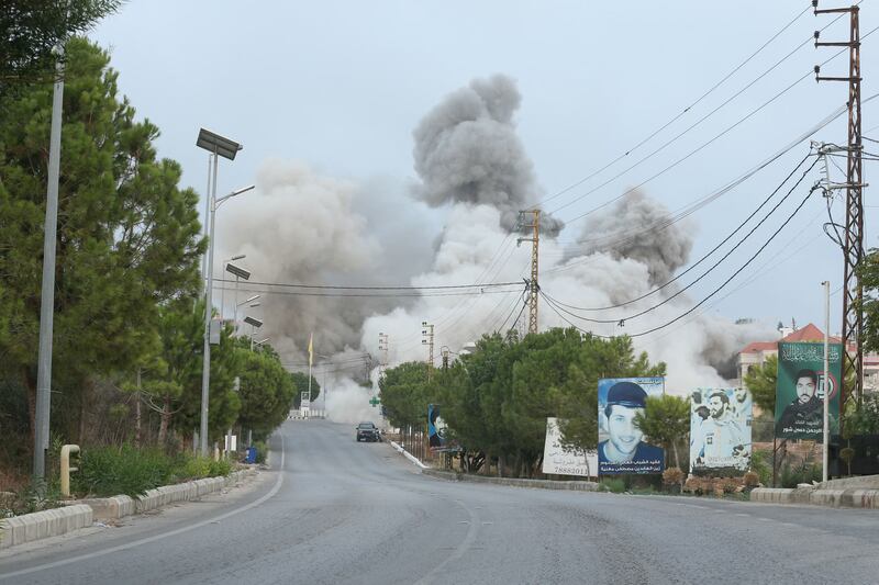Smoke rises from an Israeli airstrike in Tayr Debba. Photograph: Mahmoud Zayyat/AFP/Getty Images